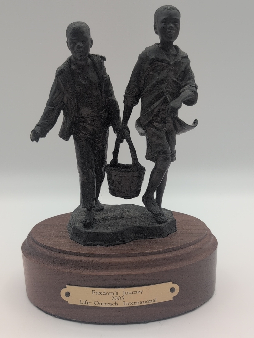 "Freedom's Journey" bronze sculpture created by artist Robert Summers